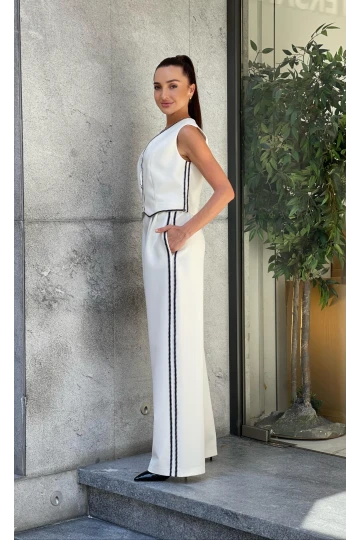 Trend Kadın Çoban Dikişli Yelek ve Pantolon Takımı ile Tarzınıza Zarif ve Hoş Bir Dokunuş Ekleyin